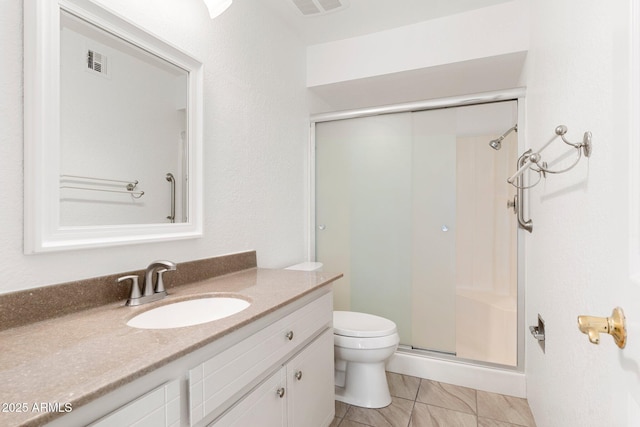 full bathroom with toilet, a shower stall, visible vents, and vanity