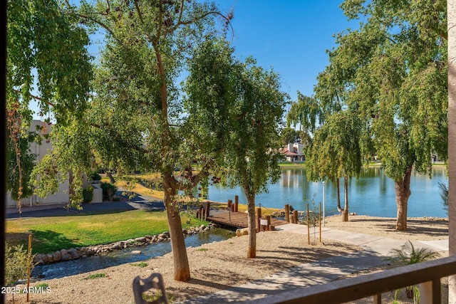 view of water feature with a dock