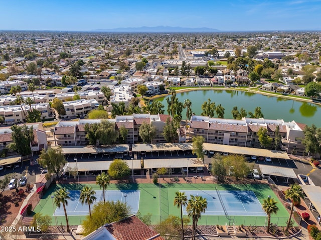 aerial view featuring a residential view and a water and mountain view