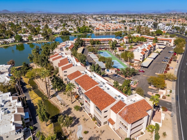 aerial view with a water view and a residential view