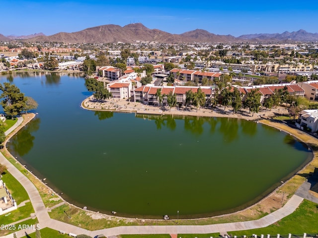 birds eye view of property featuring a residential view and a water and mountain view