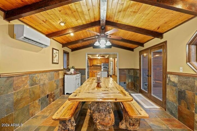 dining space featuring wood ceiling and tile walls