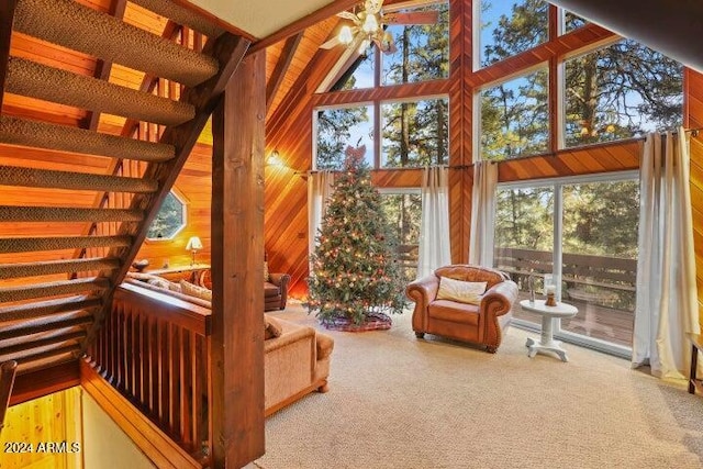 sunroom / solarium with vaulted ceiling with beams