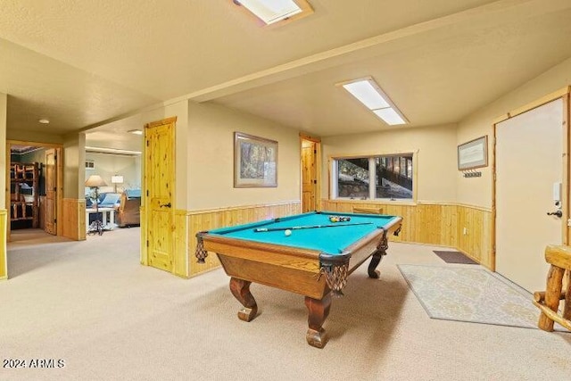 recreation room featuring wooden walls, light colored carpet, and pool table