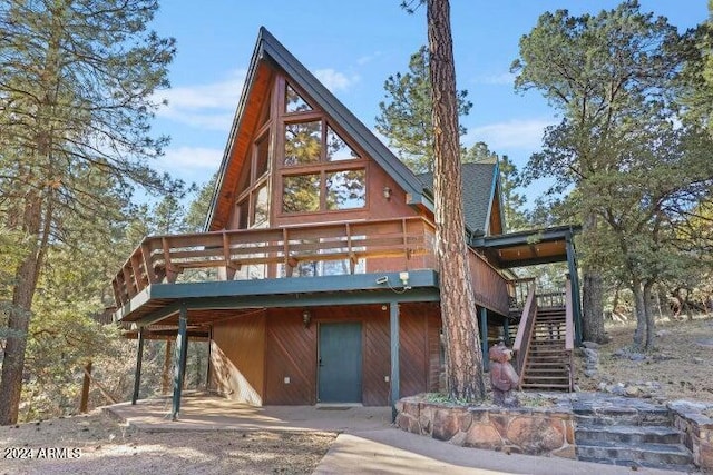 cabin featuring a wooden deck