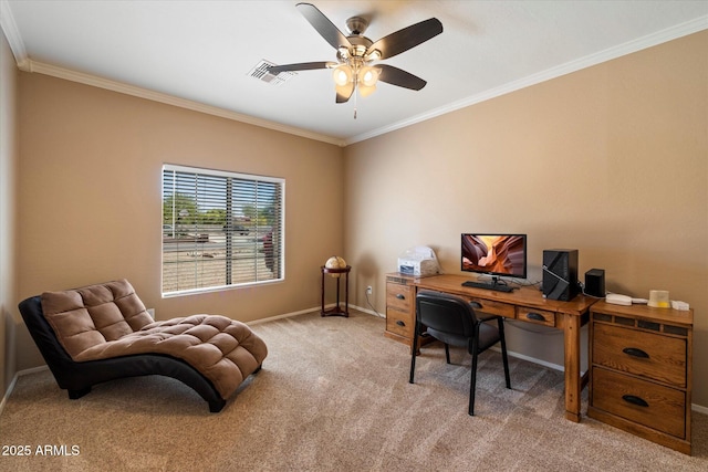 carpeted office space featuring ornamental molding, a ceiling fan, visible vents, and baseboards
