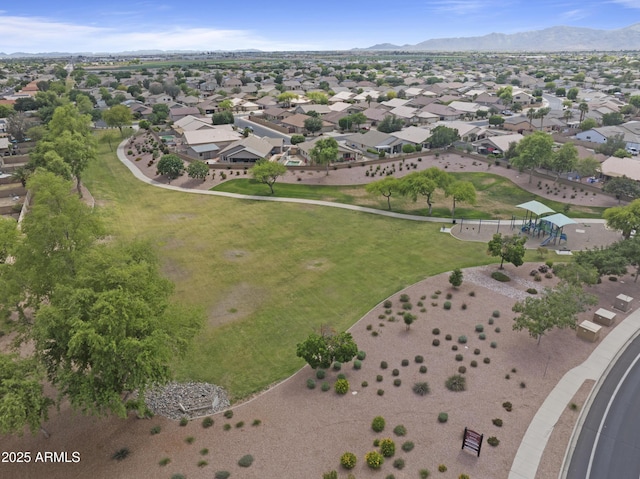 drone / aerial view with a residential view and a mountain view