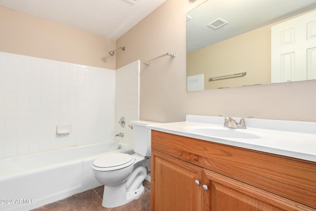 full bathroom featuring toilet, vanity, tile patterned floors, and tub / shower combination