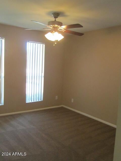 carpeted empty room with ceiling fan