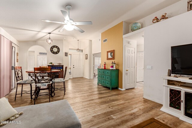 dining area with ceiling fan and light hardwood / wood-style floors