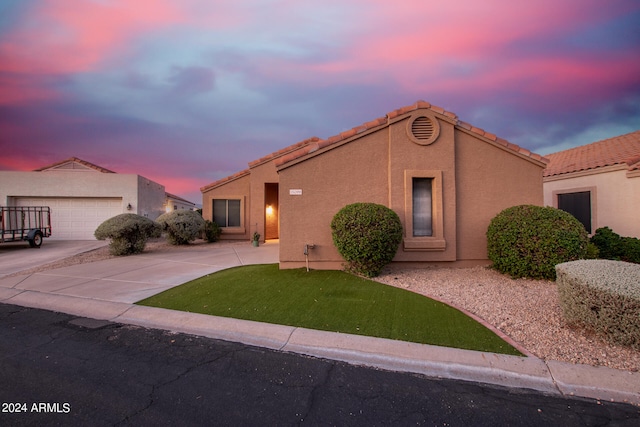 view of front of property with a garage