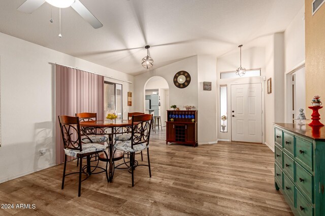 dining space featuring ceiling fan and light hardwood / wood-style flooring