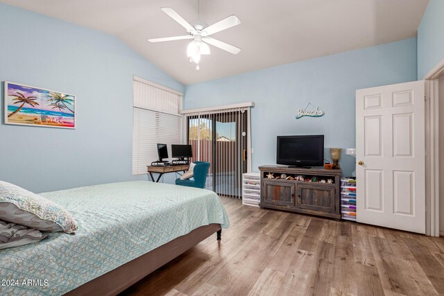 bedroom with lofted ceiling, wood-type flooring, and ceiling fan