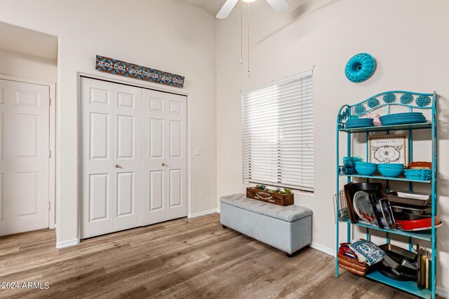 interior space with a closet, ceiling fan, and light hardwood / wood-style flooring