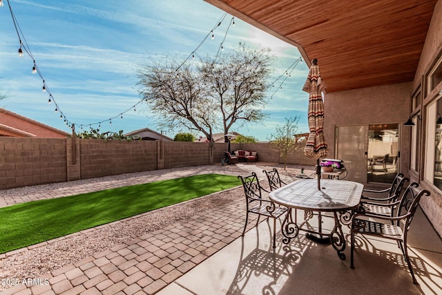 view of patio featuring a fenced backyard