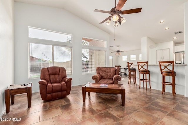 living area featuring baseboards, visible vents, a ceiling fan, high vaulted ceiling, and recessed lighting