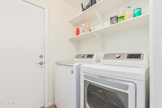 clothes washing area featuring laundry area and independent washer and dryer