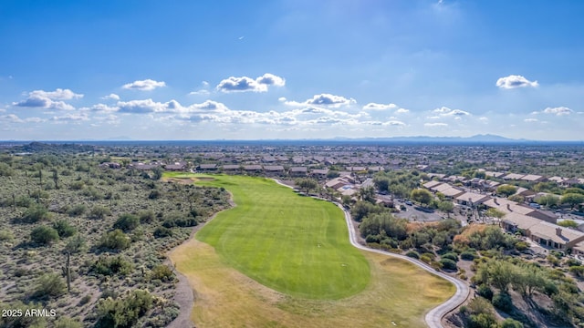 drone / aerial view featuring a residential view and golf course view