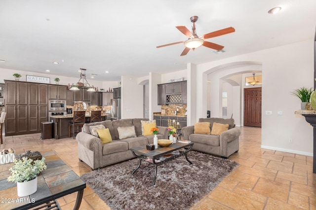 living room featuring ceiling fan