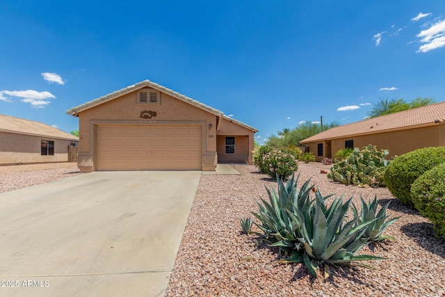1180 W Rosal Ave, Apache Junction, AZ 85120 - single story home featuring stucco siding, driveway, a tiled roof, and a garage