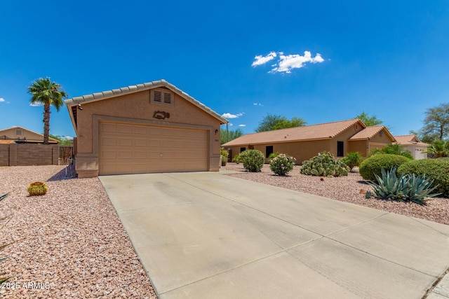 1180 W Rosal Ave, Apache Junction, AZ 85120 - single story home featuring stucco siding and a garage