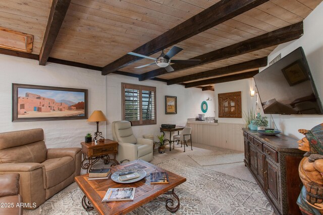 6840 E 2nd St Unit 23, Scottsdale, AZ 85251 - living area with wood ceiling with exposed beams, light colored carpet, and a ceiling fan