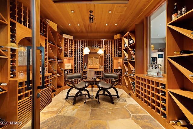 wine cellar with wooden ceiling and tile flooring