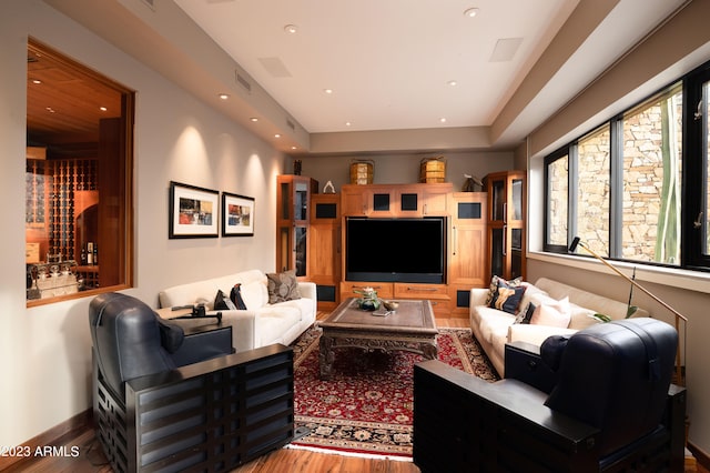 living room with hardwood / wood-style flooring and a wealth of natural light