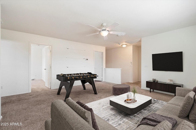 living room featuring light carpet and ceiling fan