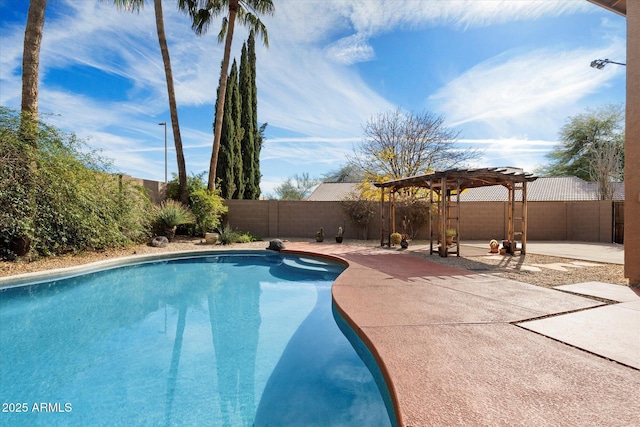 view of swimming pool featuring a pergola and a patio area