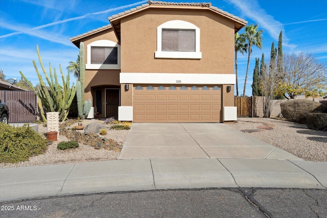 front of property with a garage