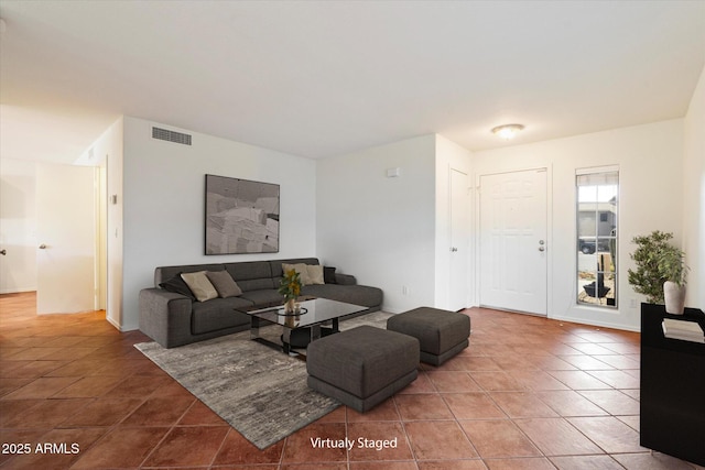 living room featuring tile patterned flooring