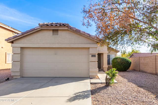 view of front of home with a garage