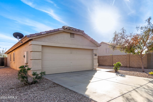 view of home's exterior featuring a garage