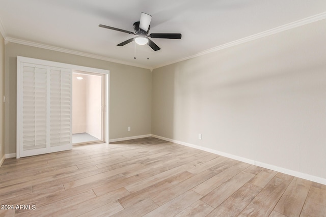 unfurnished bedroom with light wood-type flooring, ceiling fan, and crown molding