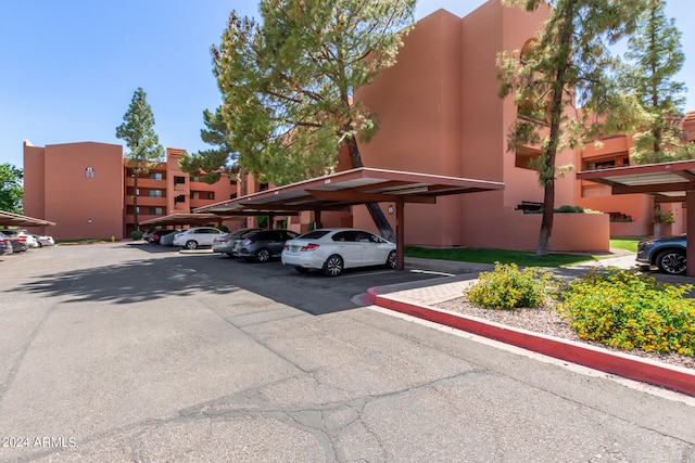 view of parking featuring a carport