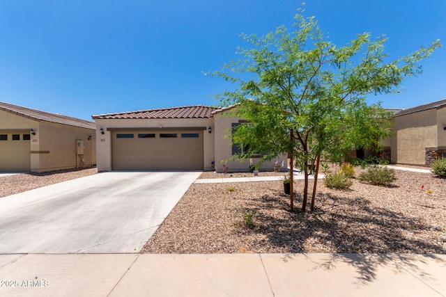 1617 W Pima Ct, Coolidge, AZ 85128 - view of front of property with stucco siding, a tile roof, driveway, and a garage