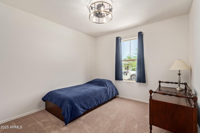 1617 W Pima Ct, Coolidge, AZ 85128 - bedroom featuring carpet and a chandelier