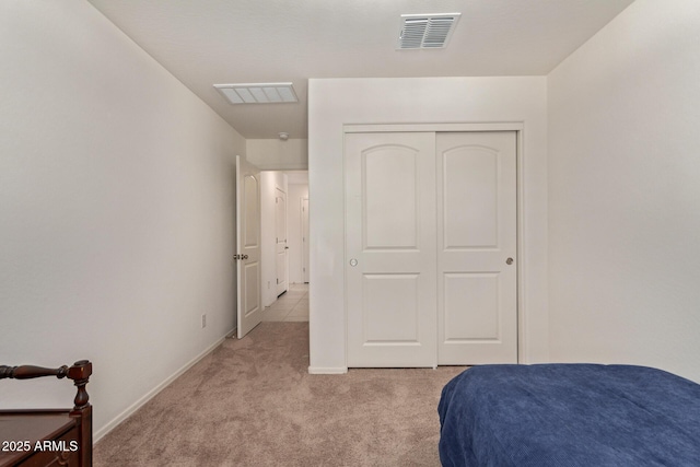 1617 W Pima Ct, Coolidge, AZ 85128 - bedroom with light carpet and a closet