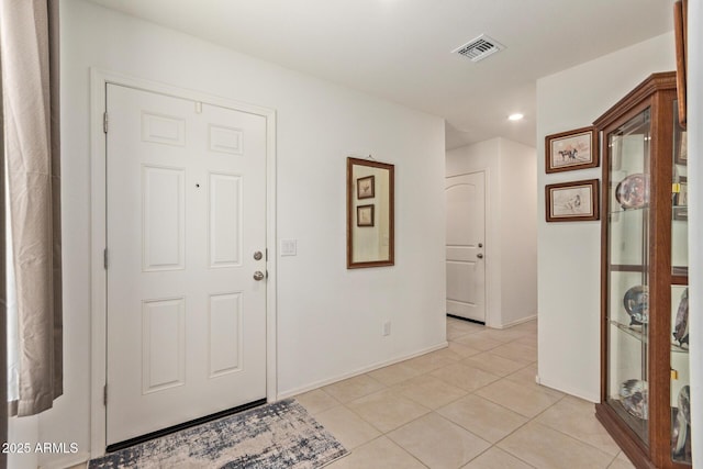 1617 W Pima Ct, Coolidge, AZ 85128 - foyer entrance featuring light tile patterned flooring and recessed lighting