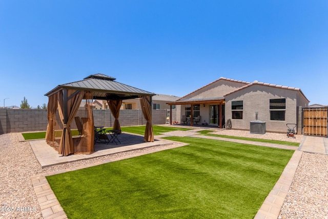 1617 W Pima Ct, Coolidge, AZ 85128 - fenced backyard featuring a patio and a gazebo