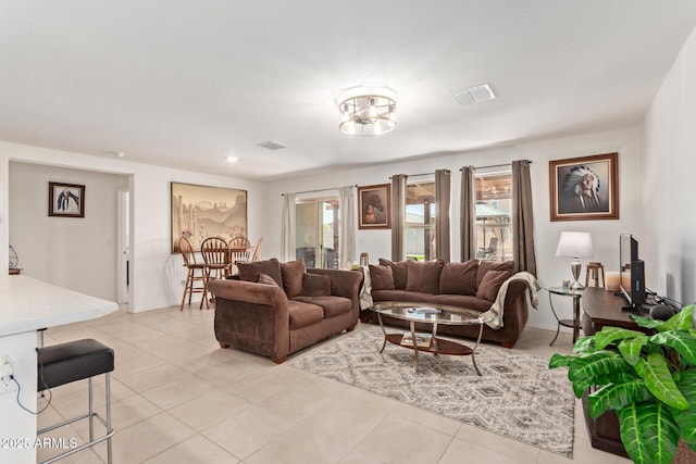 1617 W Pima Ct, Coolidge, AZ 85128 - living area featuring healthy amount of natural light and light tile patterned flooring