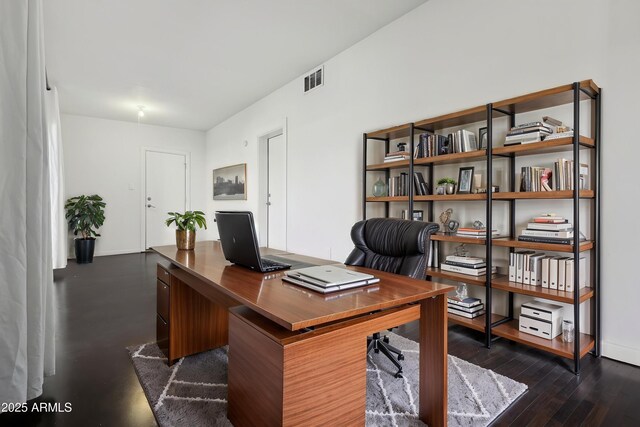 2740 N 21st Dr, Phoenix, AZ 85009 - office featuring baseboards, visible vents, and dark wood finished floors