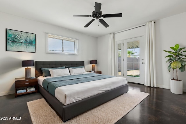 2740 N 21st Dr, Phoenix, AZ 85009 - bedroom featuring finished concrete flooring, access to outside, baseboards, and multiple windows