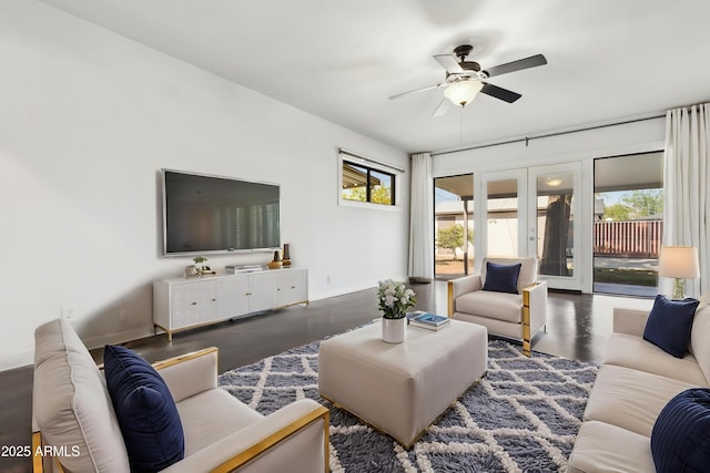 2740 N 21st Dr, Phoenix, AZ 85009 - living room with french doors, ceiling fan, and baseboards