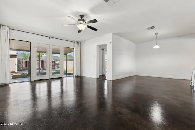 2740 N 21st Dr, Phoenix, AZ 85009 - empty room with concrete floors, a ceiling fan, visible vents, french doors, and baseboards