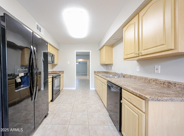 7439 E Ed Rice Ave, Mesa, AZ 85208 - kitchen with black appliances, light brown cabinets, a sink, light countertops, and light tile patterned floors