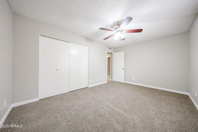 7439 E Ed Rice Ave, Mesa, AZ 85208 - unfurnished bedroom with a closet, a textured ceiling, baseboards, carpet flooring, and ceiling fan