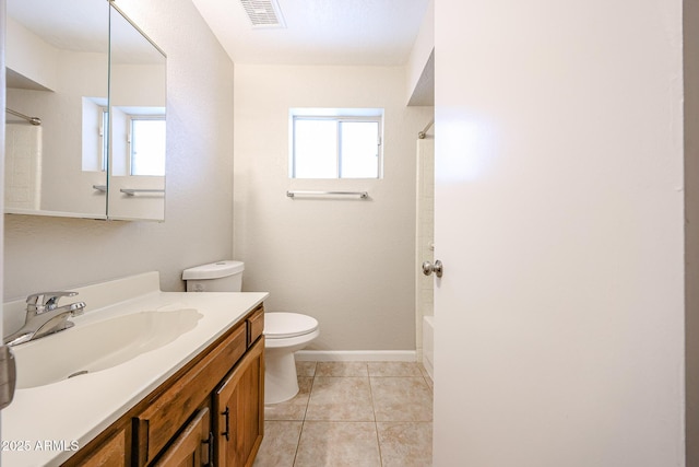 7439 E Ed Rice Ave, Mesa, AZ 85208 - full bathroom with vanity, toilet, shower / bathtub combination, tile patterned floors, and baseboards