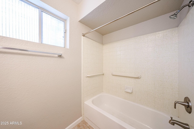 7439 E Ed Rice Ave, Mesa, AZ 85208 - full bath with  shower combination, baseboards, tile patterned floors, and a textured wall